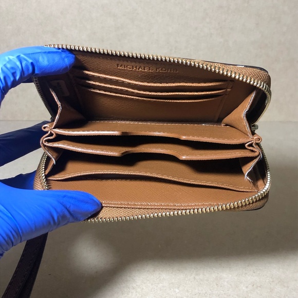 9. Michael Kors Cognac Zip Around Wristlet - Picture 7 of 14